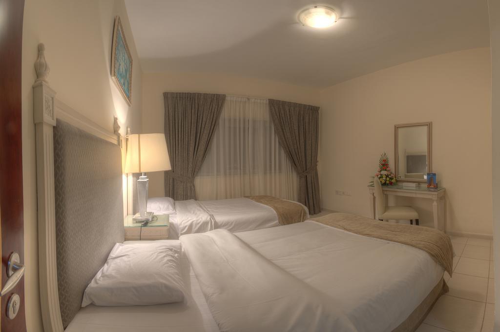 Tulip Inn Royal Suites Ajman Chambre photo