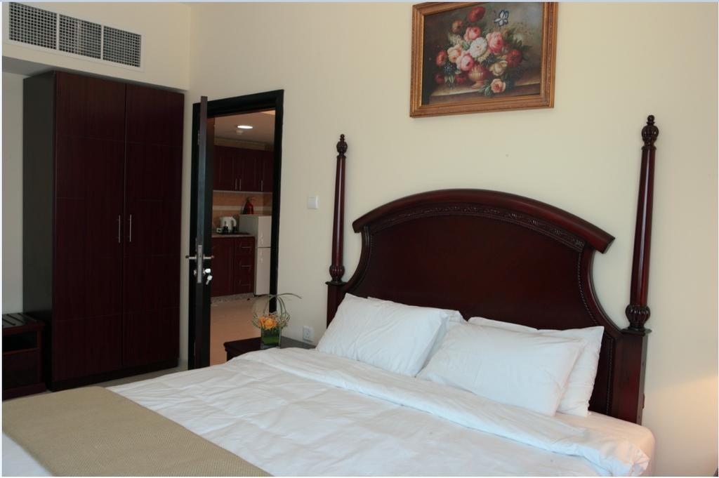 Tulip Inn Royal Suites Ajman Chambre photo